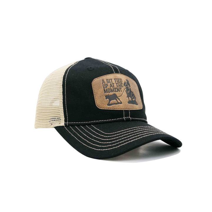 Black "A bit tied up at the moment" Trucker Cap