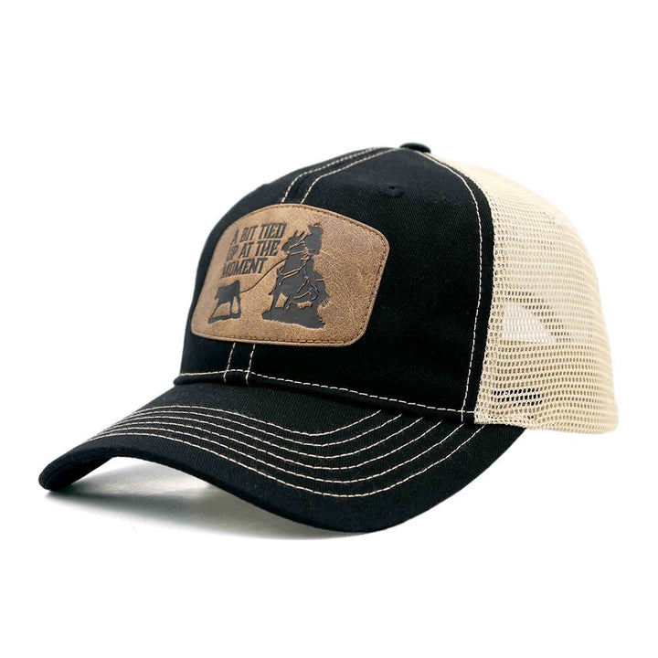 Black "A bit tied up at the moment" Trucker Cap
