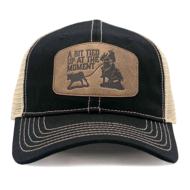 Black "A bit tied up at the moment" Trucker Cap